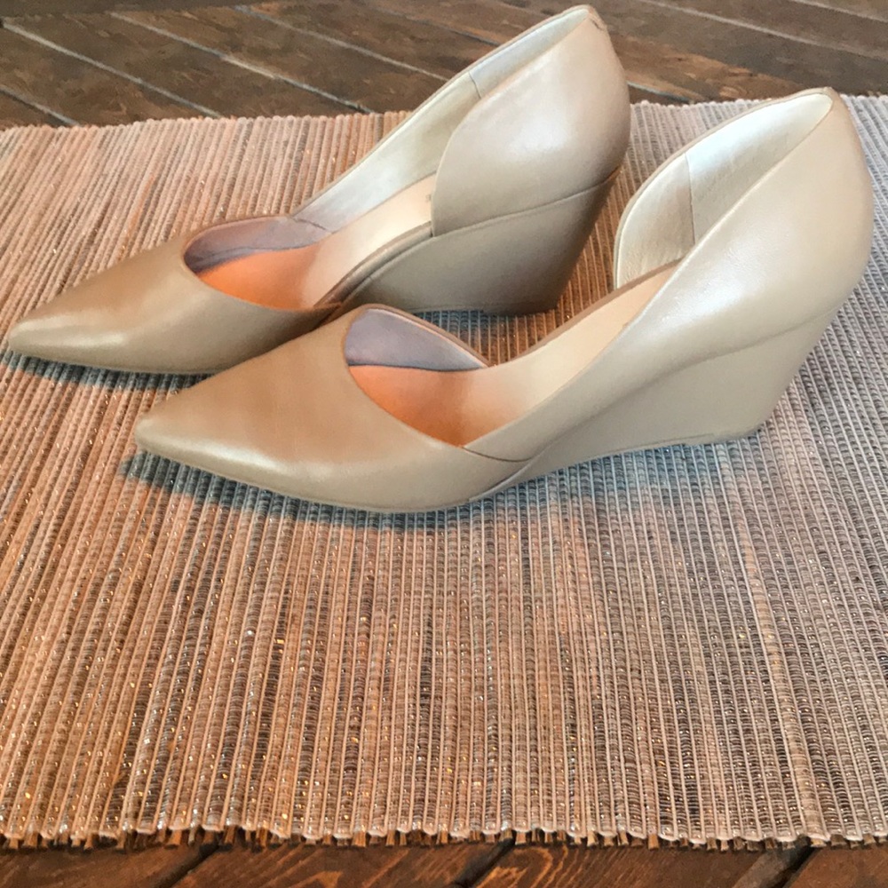 Nude closed toe wedges